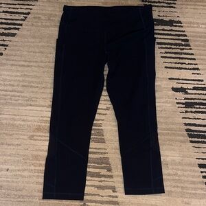 Lululemon leggings dark blue size 8 like new zipper on back
